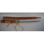 A Carved Wooden Souvenir Tribal Sword in Scabbard