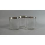 Three Silver Topped Dressing Table Pots