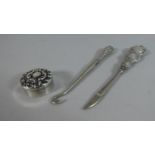 A Small Circular Silver Pill Box and Two Silver Handled Manicure Tools