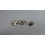 A 9 Carat and White Stone, 'Daisy Ring', a Gold and Pearl Ladies Dress Ring, Hallmark Unclear, and a