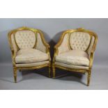 A Pair of French Style Salon Armchairs with Carved Gilt Frames on Turned and Reeded Supports