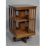 An Edwardian Mahogany Revolving Bookcase with Walnut Crossbanding to Top, 50cms Square