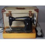 An Electric Singer Sewing Machine with Foot Pedal