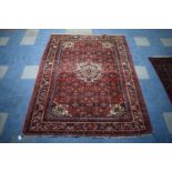 A Persian Hand-Made Malayer Rug, 204 x 153cms