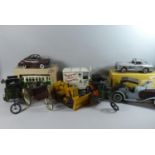 A Collection of Nine Reproduction Tinplate Vehicles to Include Tram, Bulldozer, Steamcar, Cheswick