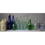 A Collection of Glass and Stone Ware to Include Decorative Blue and Green Glass Bottles, Stoneware