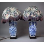 A Pair of Oriental Blue and White Table Lamps in the Form of Vases with Elephant Handles, 38cms High
