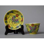 A Late 19th/Early 20th Century Chinese Famille Rose on Yellow Ground Tea Bowl and Saucer with