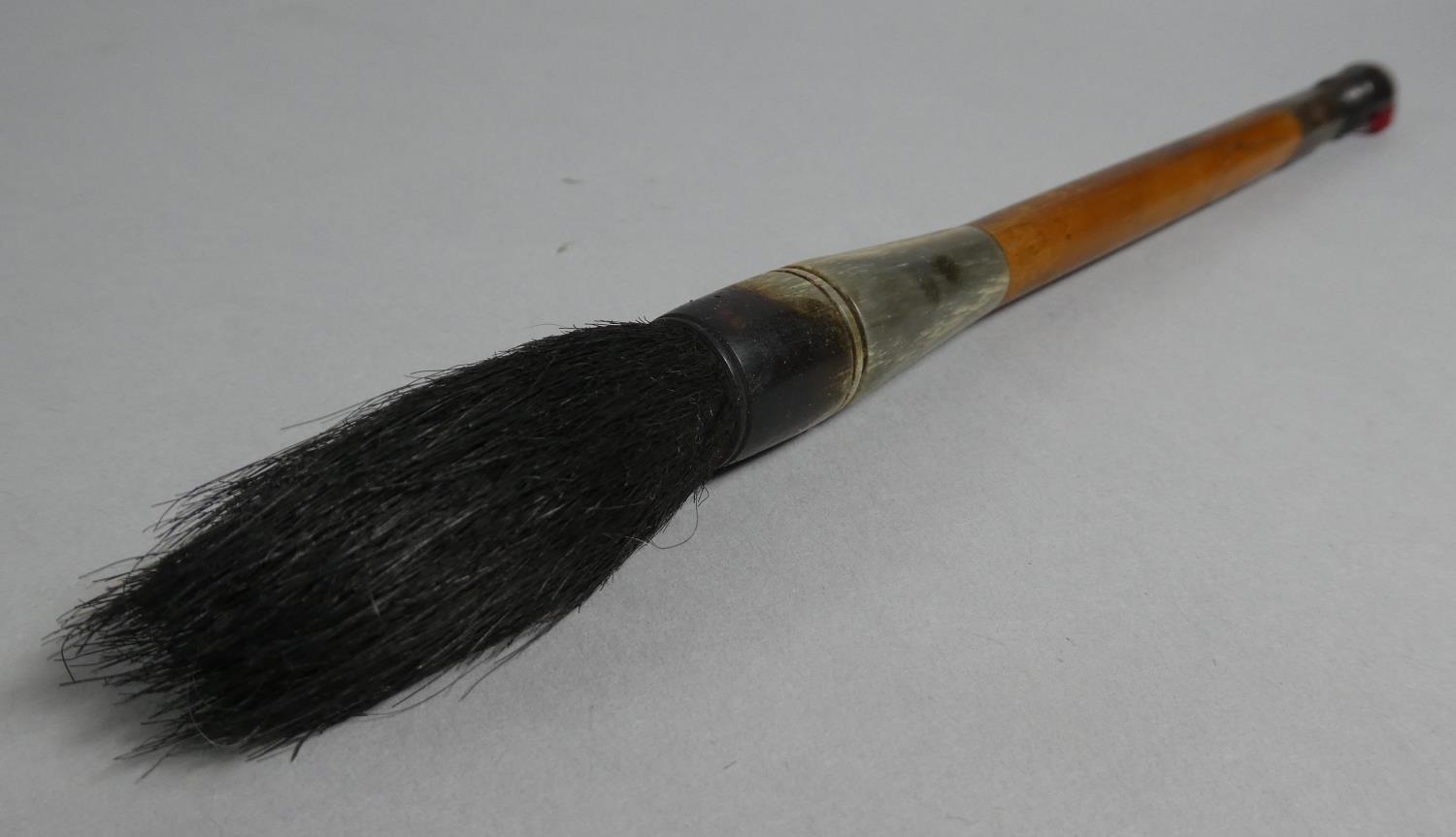 An Oriental Bamboo and Horn Handled Calligraphy Brush, Signed