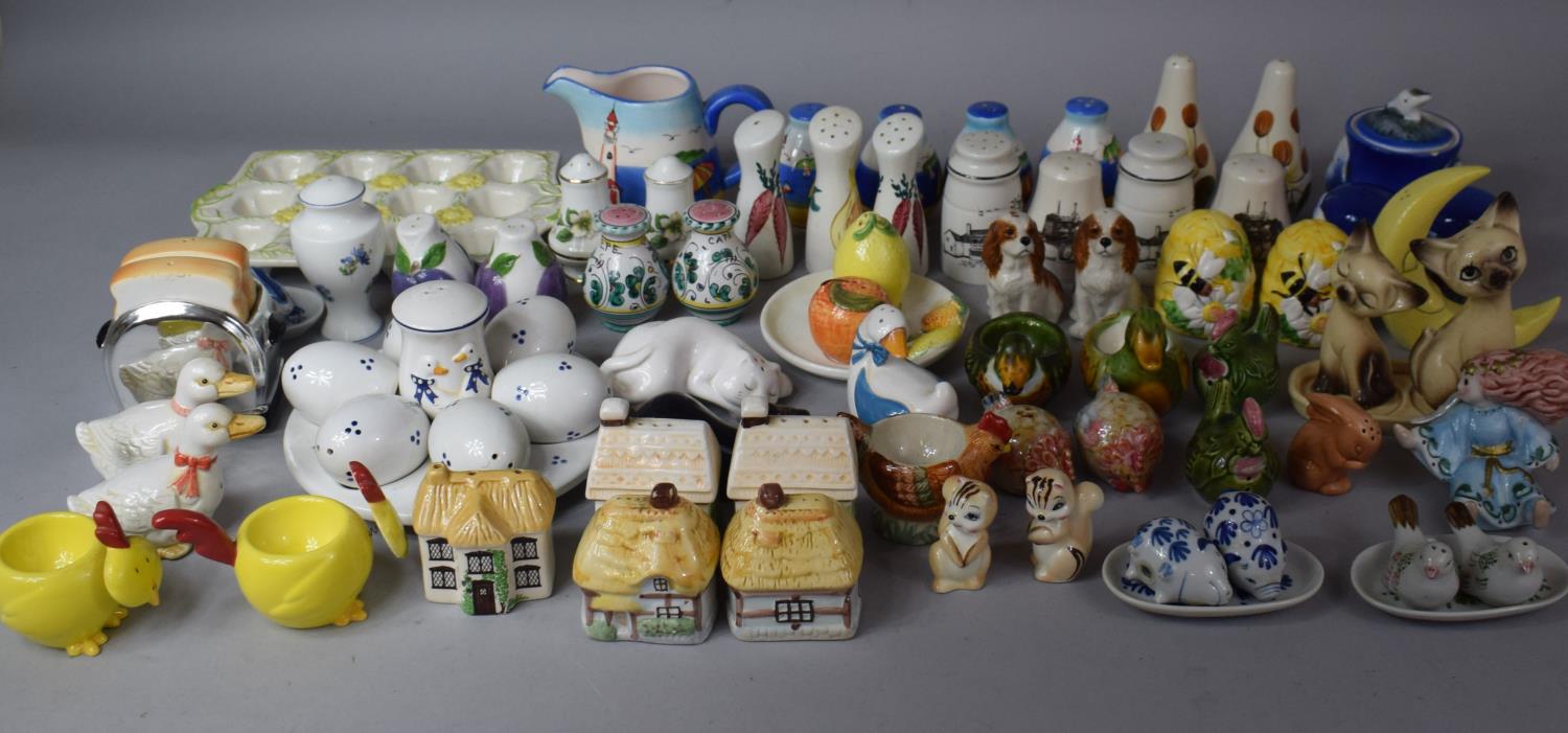 A Large Collection of Novelty Ceramic Cruets