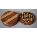 A Small Circular Turned Wooden Traveling Chess Set (incomplete)