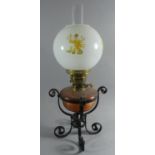 A Wrought Iron Based Oil Lamp with Copper Reservoir, Brass Fittings and Opaque Glass Shade, 60cm