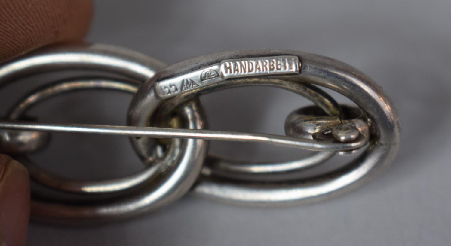 A German Silver Brooch by Handarbeit in the Form of Interlocking Links - Image 2 of 2