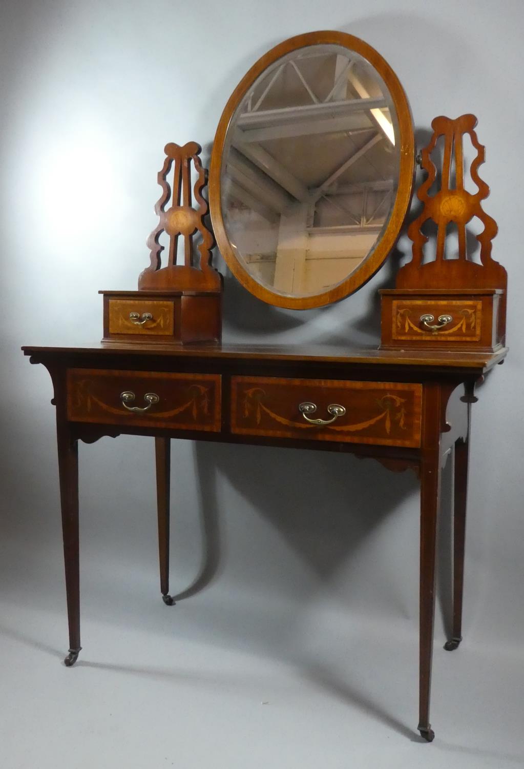 A Pretty Inlaid Edwardian Mahogany Dressing Table with Two Drawers, Oval Mirror and Two Jewel