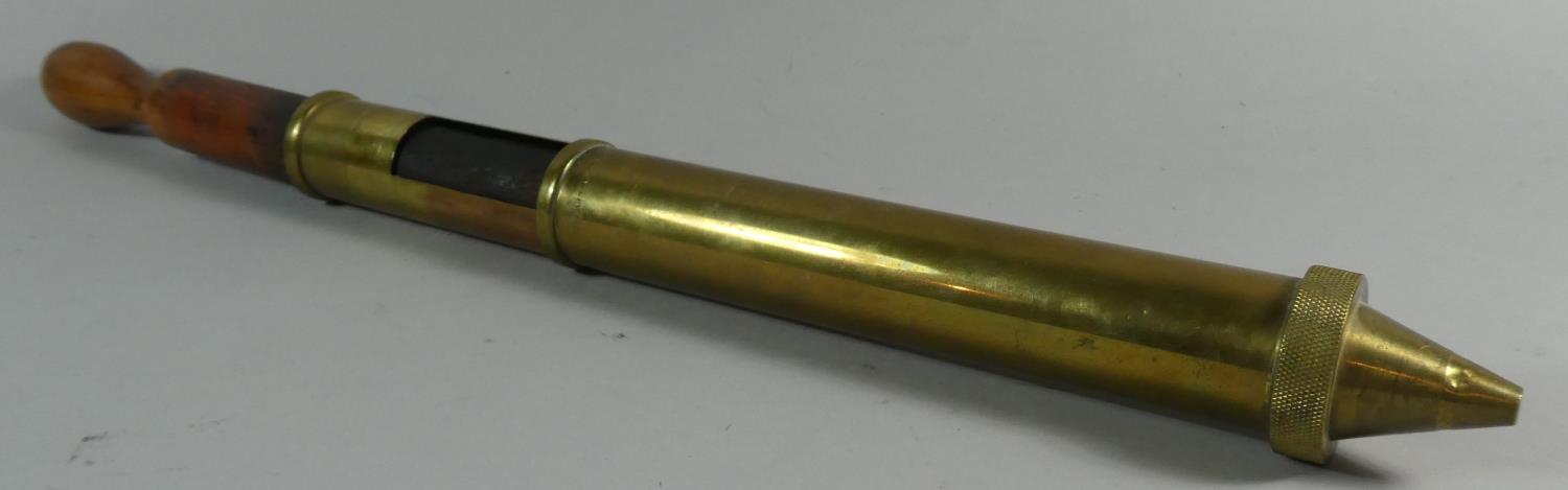 A Vintage Brass Nesthill Royalty Patent Brass Greaser with Wooden Plunger as Used by Rolls Royce and