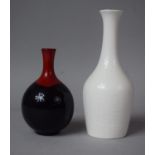 A Small Royal Doulton Flambe Vase and a Royal Doulton Creamware Vase, 16cm high