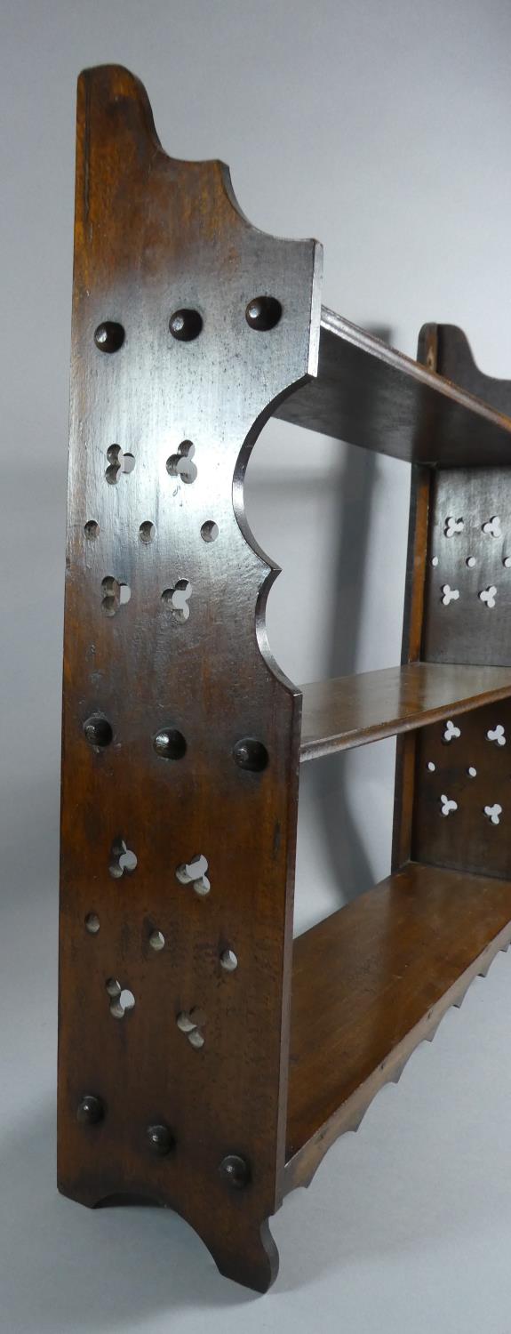 An Edwardian Mahogany Three Tier Wall Mounting Shelf with Pierced Supports, 57cm Wide - Image 2 of 2