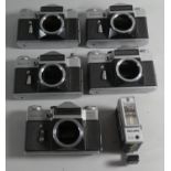 A Collection of Five Zenit 35mm Camera Bodies and a Flash Gun (no Lenses)