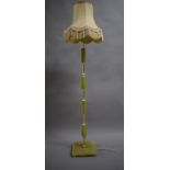 A Brass and Onyx Effect Standard Lamp