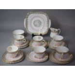 A Pink and Gilt Pattern Tea Set to Comprise Six Cups, Five Saucers, Six Side Plates, Cake Plate,