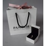 A Boxed Pandora Charm Having Enamelled Lipstick, Shoe and Dress Miniature Droppers Complete with Bag