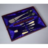 A Cased Collection of Silver Mounted Button Hooks, Shoe Horn and Manicure Tools