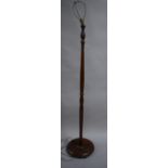 An Edwardian Turned Mahogany Standard Lamp, Fitting Requires Refixing