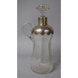 A Silver Mounted Claret Jug, London Hallmark, 25cm High