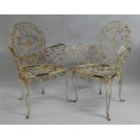 A Pair of 19th Century Wrought Iron Scroll Garden Armchairs with Maltese Cross Emblems to Centre