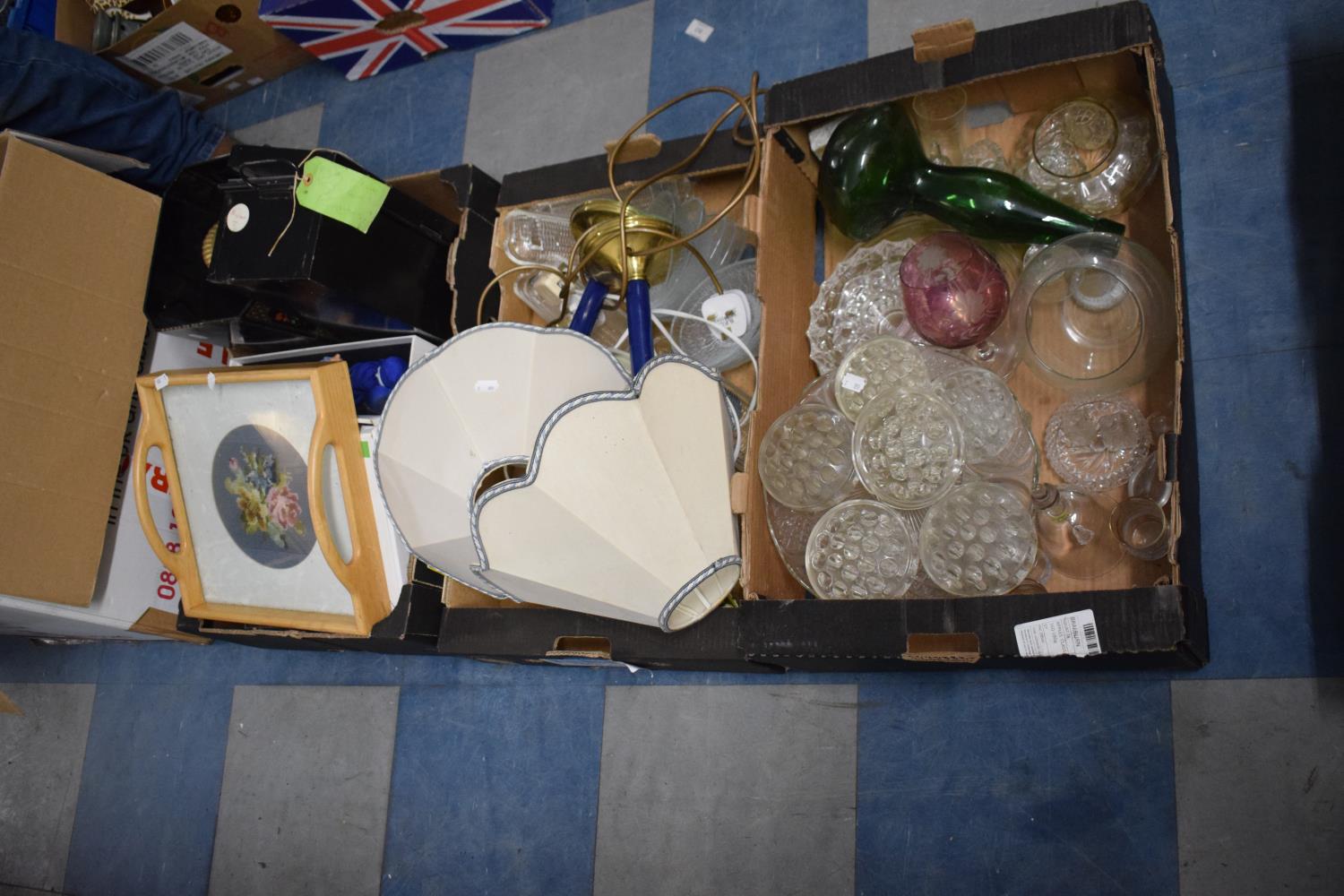 Three Boxes Containing Glassware, Table Lamps, Two Handled Tray, Dolls, Limoncello Set etc