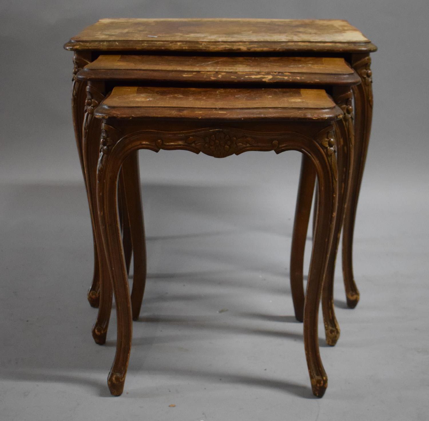 A Nest of Three Crossbanded Inlaid Burr Walnut Tables by Hale and Epstein, badly water stained and