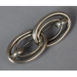 A German Silver Brooch by Handarbeit in the Form of Interlocking Links