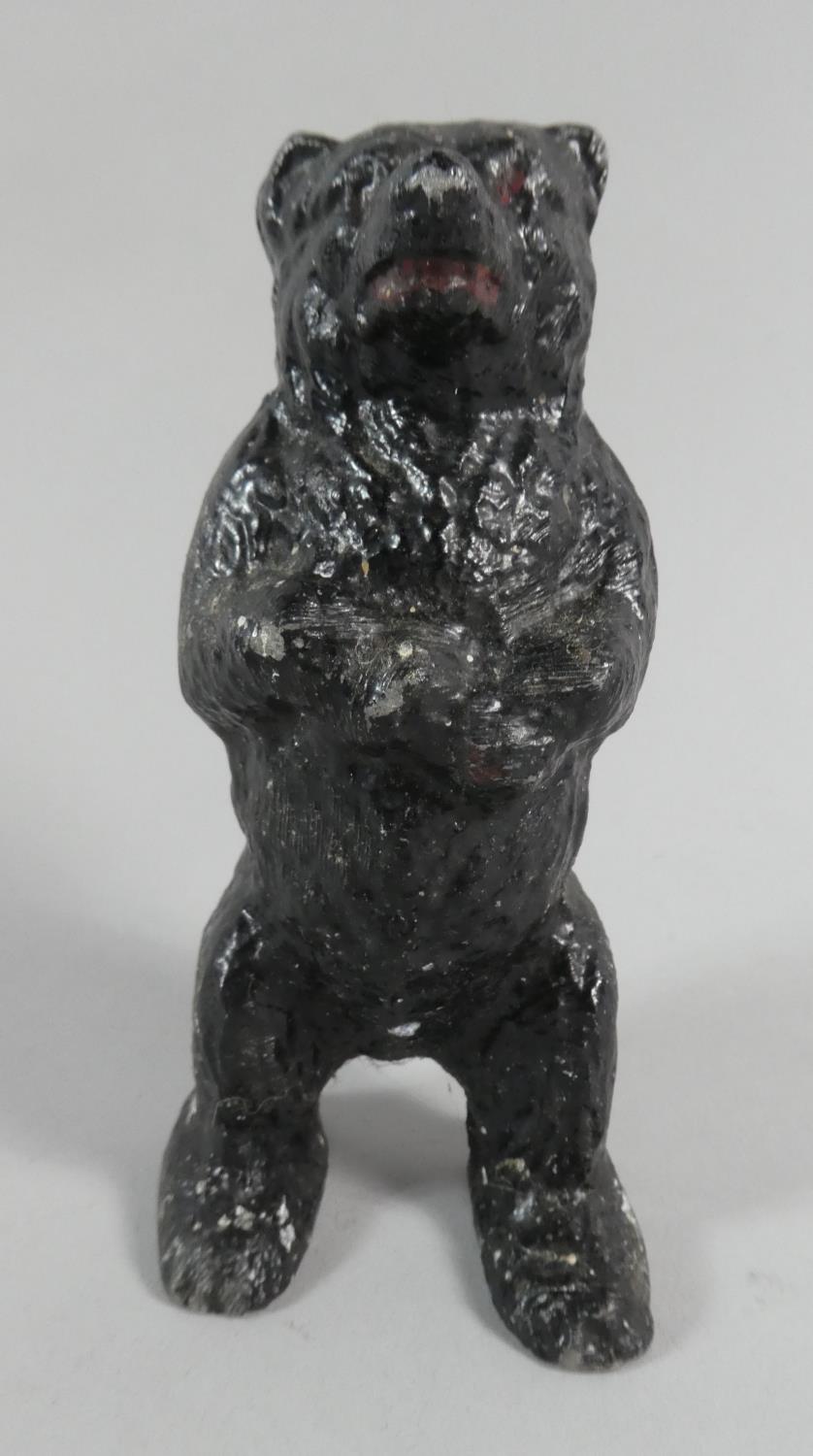 A Black Painted Reproduction Spelter Copy of a Cast Iron Standing Bear Money Box, 15cm High