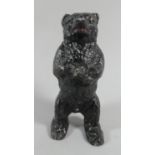 A Black Painted Reproduction Spelter Copy of a Cast Iron Standing Bear Money Box, 15cm High