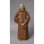 A French Novelty Glazed Decanter in the Form of a Monk, Le Moine Legendaire, 29cm High