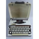A Vintage Manual Portable Deluxe 900 Typewriter