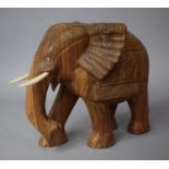 A Hand Carved Far Eastern Study of an Elephant, 20cm High