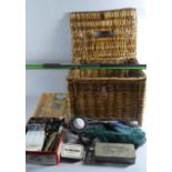 A Wicker Fishing Basket Containing Floats, Lines, Landing Net, Hook, Spinners etc Together with a