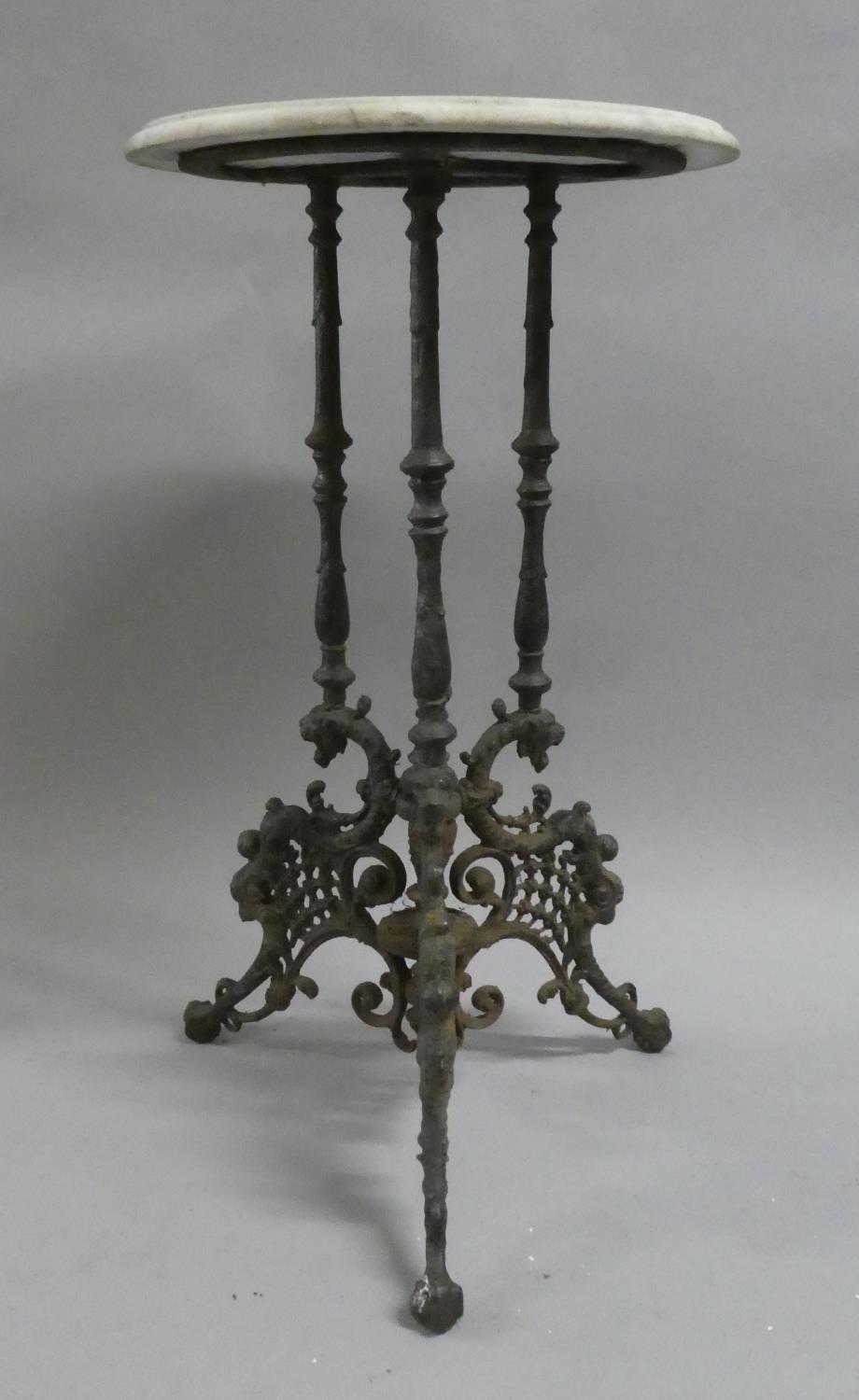 A 19th Century Coalbrookdale Style Cast Iron and Marble Topped Tripod Garden Table with Claw and