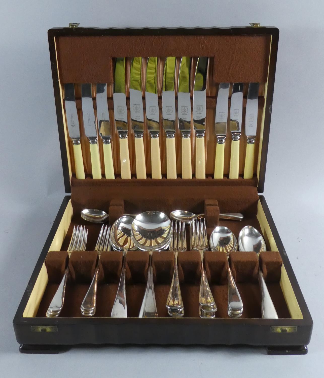 An Edwardian Oak Cased Canteen of Silver Plated and Bone Handled Cutlery