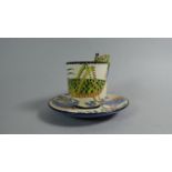 An Ardmore Studio Pottery Coffee and Saucer, Decorated with Hand Painted Cricket and Floral Design