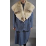 A Ladies Two Piece Suit Having Fox Fur Collar by Holland and Sherry London