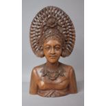 A Balinese Carved Teak Bust of Goddess with Headdress, 35cm high