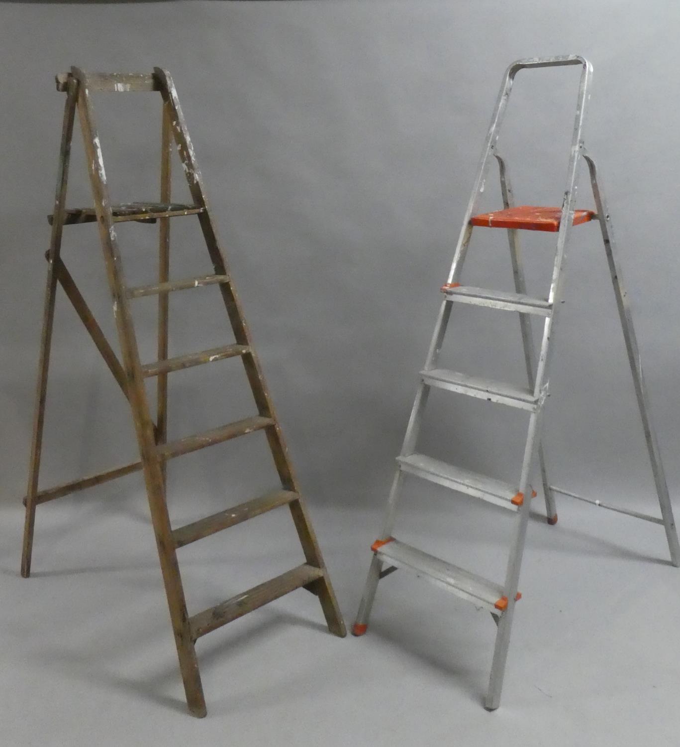 A Vintage Wooden Five Step Stepladder and an Aluminum Example