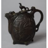 A Small Reproduction Bronze Chinese Libation Ewer with Etched Decoration Depicting Phoenix. 8cm High