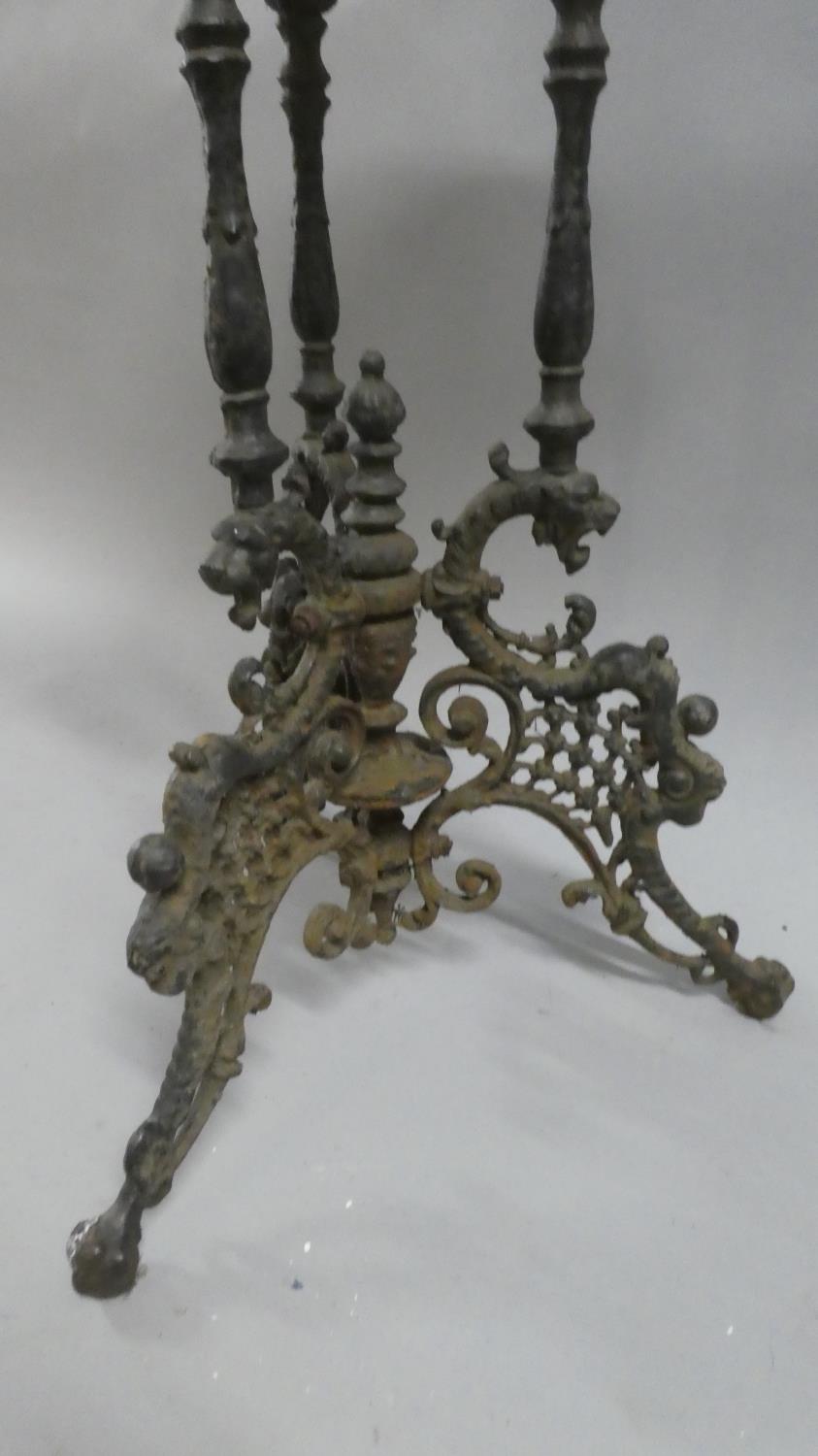 A 19th Century Coalbrookdale Style Cast Iron and Marble Topped Tripod Garden Table with Claw and - Image 2 of 2