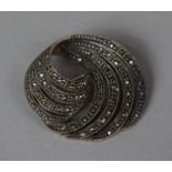 A Silver Art Deco Style Marcasite Brooch of Circular Swirl Form, 10.4g