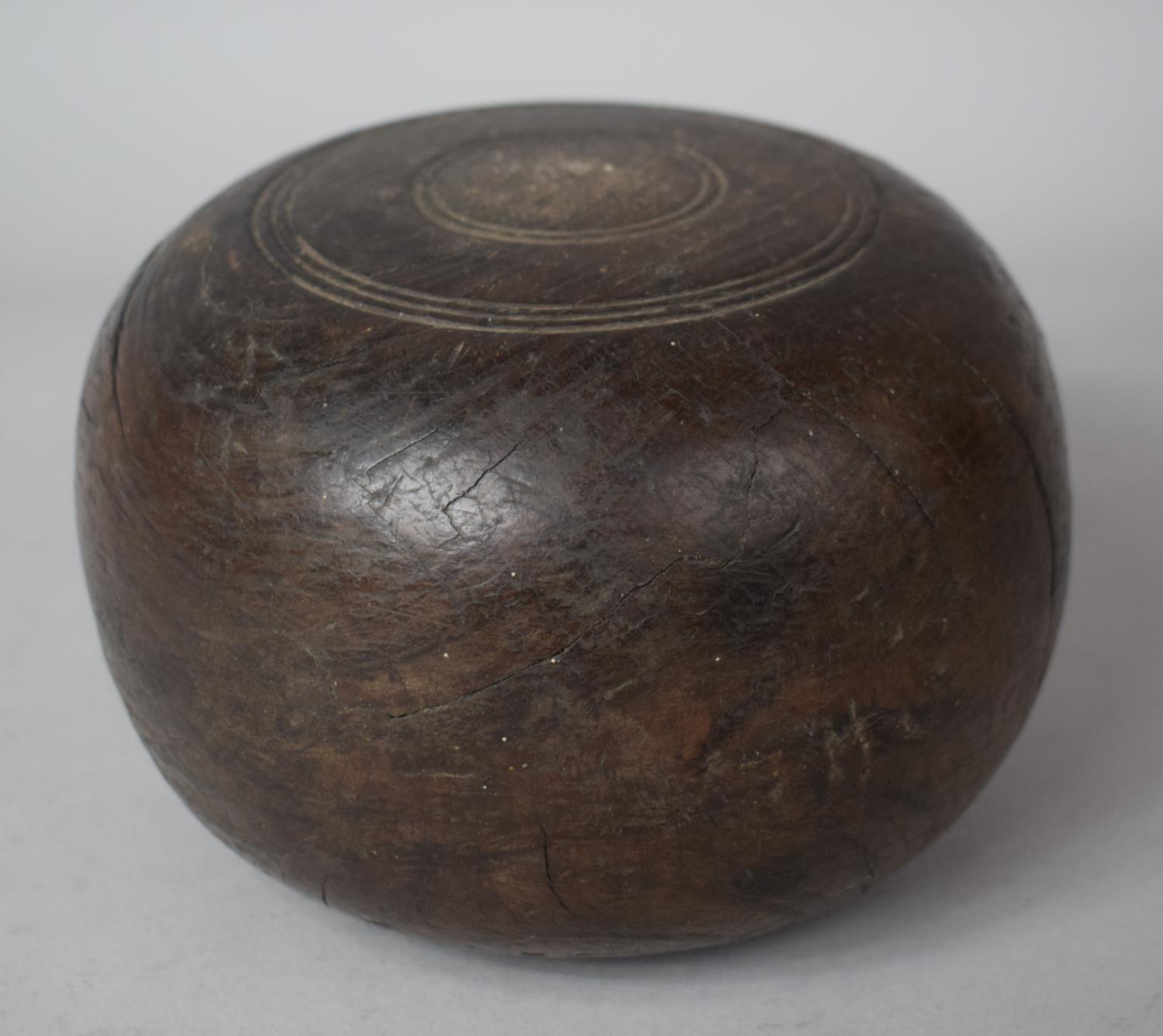 An Early 19th Century Circular Turned Wooden Lawn Bowl, 16cm Diameter