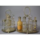 A Silver Plate and Glass Six Six Bottle Cruet and a Four Bottle Example, One Stopper Unrelated and