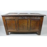 An Early 19th Century Oak Three Panel Coffer Chest with Carved Top Rail, 120cm Wide